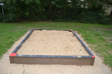 Sandreinigung auf dem Kinderspielplatz